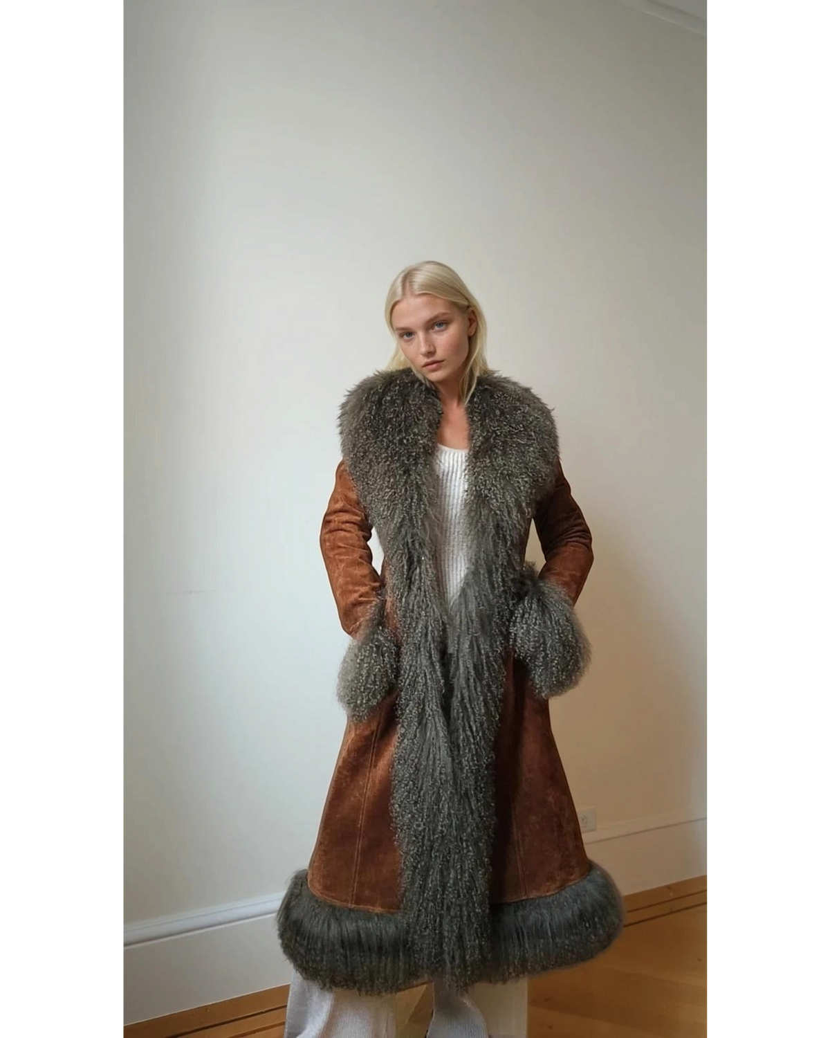 Reihana coat by Aql&Nafs in brown suede with Mongolian shearling at collar, cuffs and hem