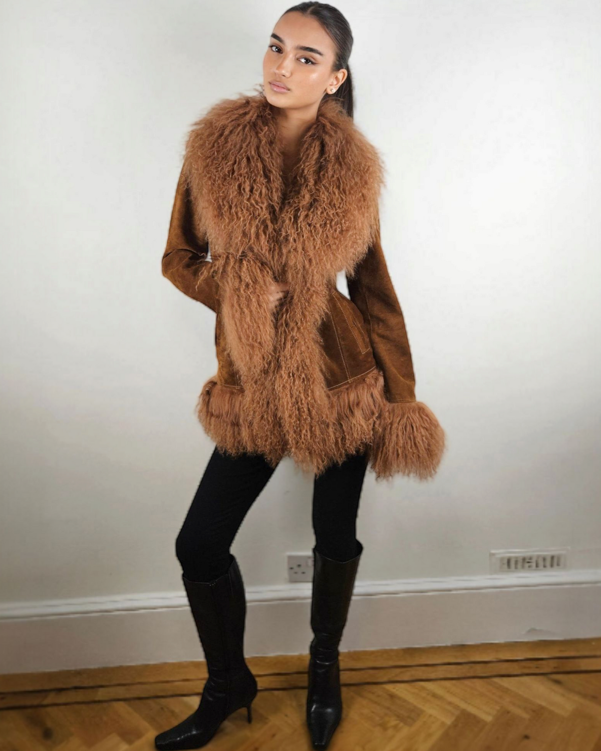 Zarifa coat by Aql&Nafs in brown suede with Mongolian shearling collar and cuffs