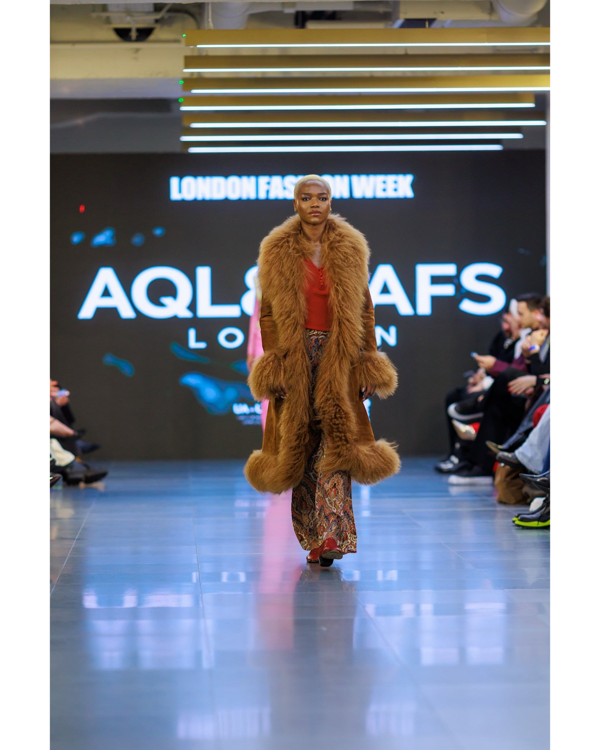 Amira coat by Aql&Nafs in brown suede with Mongolian shearling at collar, cuffs and hem